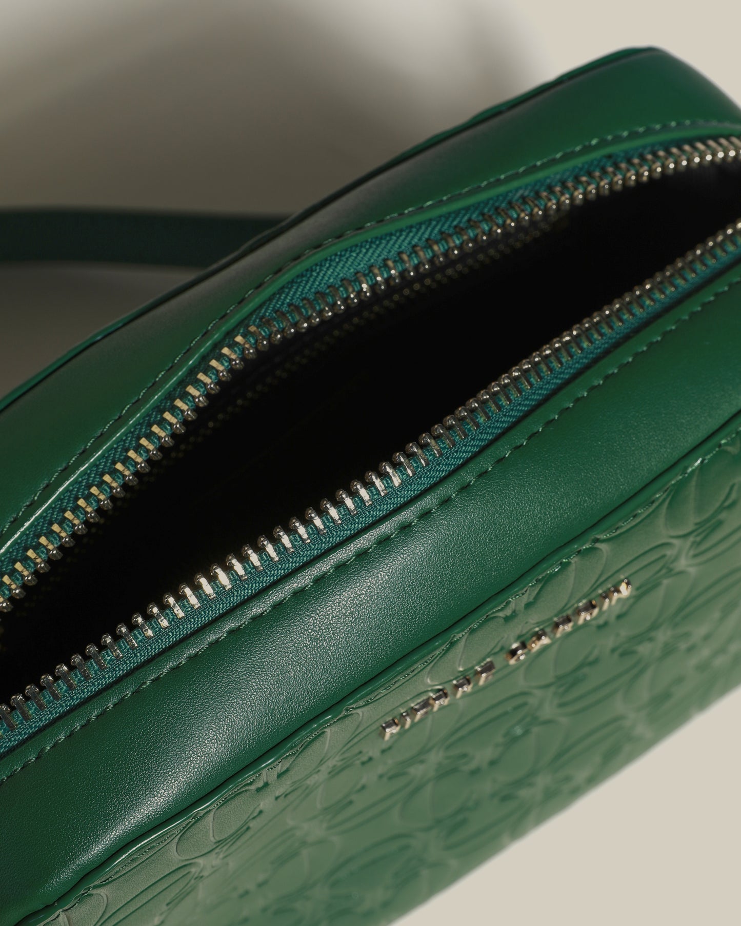 All-Over Embossed Crossbody Bag